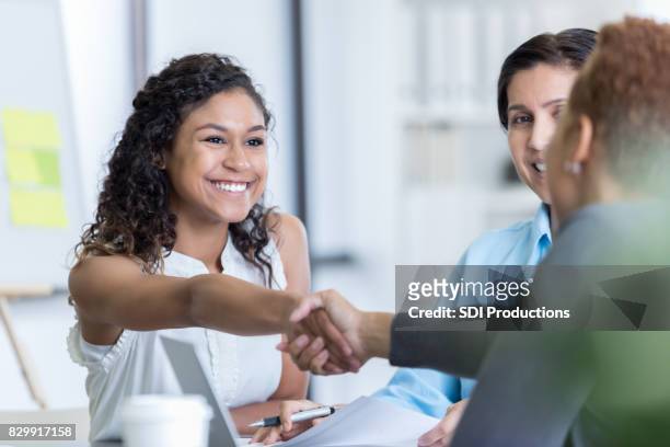 office manager interviews potential new employee - interview event stock pictures, royalty-free photos & images