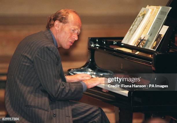 Australian pianist David Helfgott, subject of the award-winning film Shine, rehearses at the Royal Festival Hall before making his UK debut tomorrow...