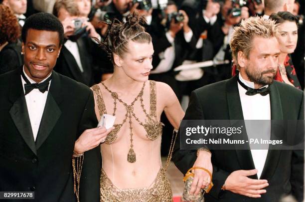 Chris Tucker, Milla Jovovich and Director Luc Besson arrive for the premiere of The Fifth Element at the 50th Cannes Film Festival.