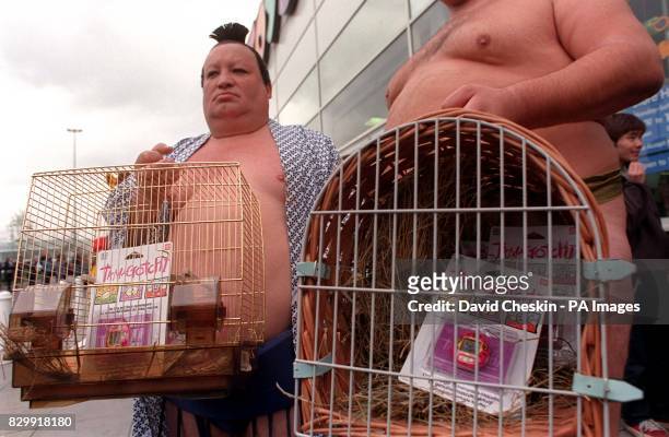 Pair of sumo wrestlers at London's Brent Cross Toys-R-Us this morning where they helped launch the Tamagotchi - virtual pet - onto the British market...