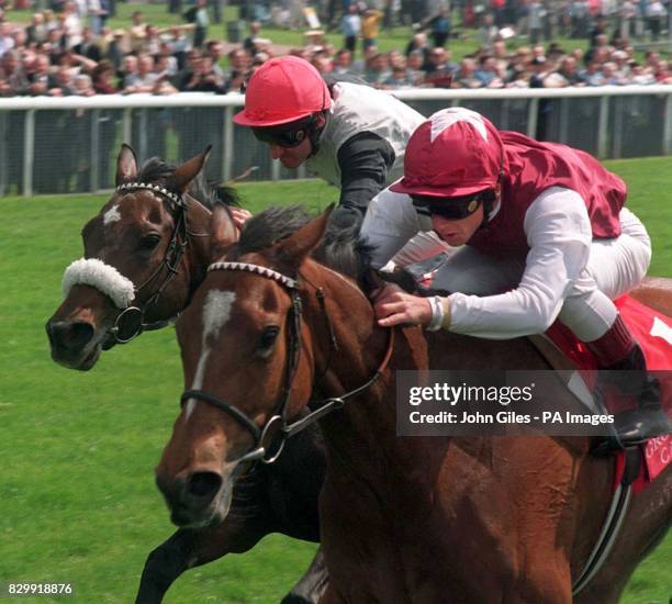 Frankie Dettori on Papering gets home ahead of Charlotte Corday and Michael Hills to win the Grosvenor Casinos Middleton Stakes at York Races...