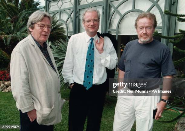 Minister for Heritage Chris Smith meets directors Alan Parker and Ridley Scott during an announcement of film funding by Labour in Cannes tonight . *...