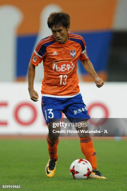 Masaru Kato of Albirex Niigata in action during the J.League J1 match between Albirex Niigata and Kawasaki Frontale at Denka Big Swan Stadium on...