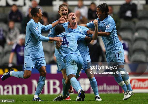 Jamie O'Hara of Tottenham Hotspur celebrates with his team mates after scoring his team's second goal during the Carling Cup Third Round match...