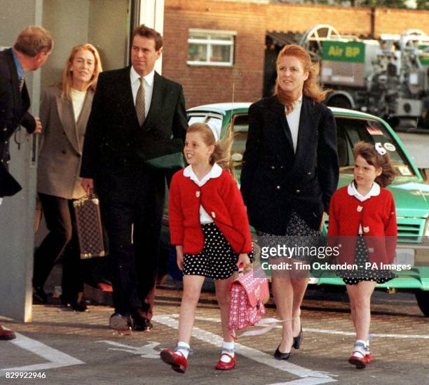 The Duke and Duchess of York, their children, Princesses Beatrice and Eugenie, and the duchess' mother, Susan Barrantes , arriving back at Heathow...
