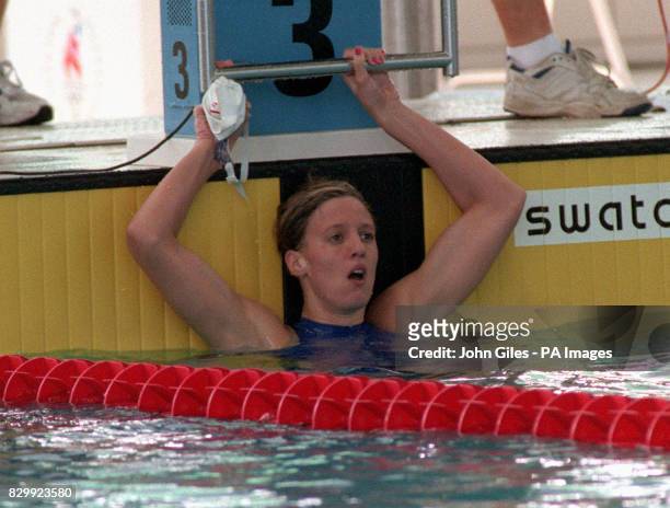 Disappointment for Karen Pickering as she finishes 5th in the preliminary heats for the Women's 100m Freestyle at the Atlanta Olympics this morning ....