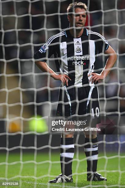 Michael Owen of Newcastle United shows his dejection during the Carling Cup Third Round match between Newcastle United and Tottenham Hotspur at St...