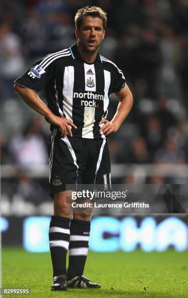 Michael Owen of Newcastle United shows his dejection during the Carling Cup Third Round match between Newcastle United and Tottenham Hotspur at St...