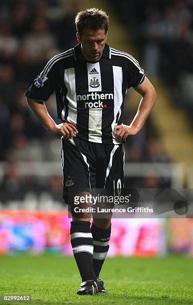 Michael Owen of Newcastle United shows his dejection during the Carling Cup Third Round match between Newcastle United and Tottenham Hotspur at St...