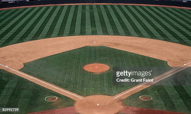 empty baseball layout in sunushine - baseball stock pictures, royalty-free photos & images