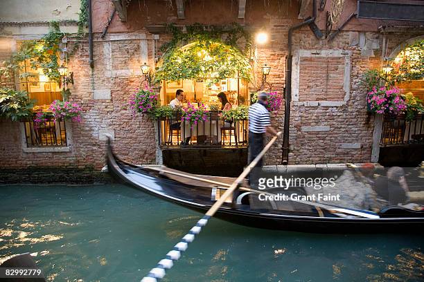 romantic couple having dinner by venian restuarant - venice italy stock pictures, royalty-free photos & images