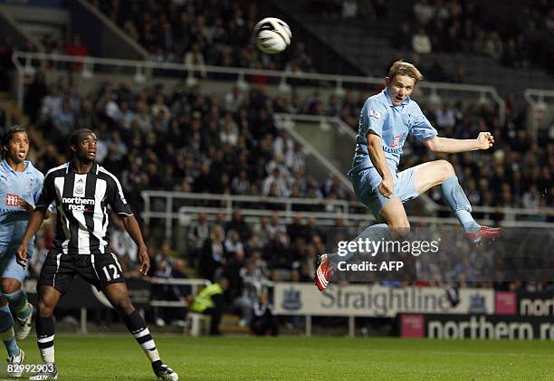 Tottenham Hotspur's Russian International Roman Pavlyuchenko scores against Newcastle United during the Carling Cup 3rd round game at ST James Park...