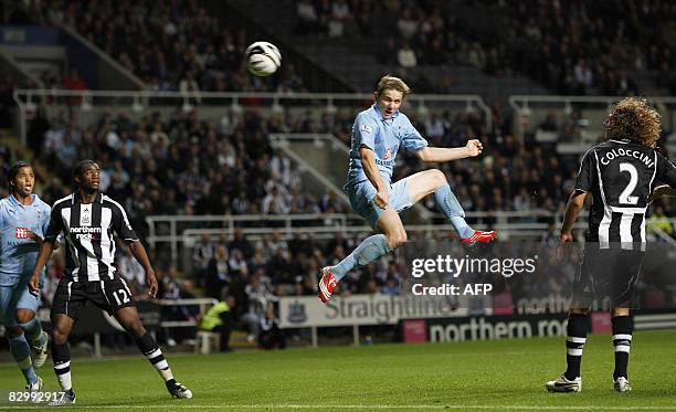 Tottenham Hotspur's Russian International Roman Pavlyuchenko scores against Newcastle United during the Carling Cup 3rd round game at ST James Park...