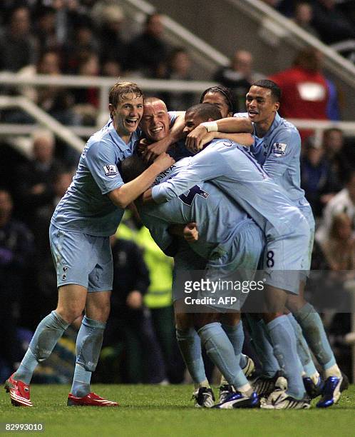 Tottenham Hotspur's Jamie Ohara celebrates with teammates after scoring the second goal against Newcastle United during the Carling Cup 3rd round...