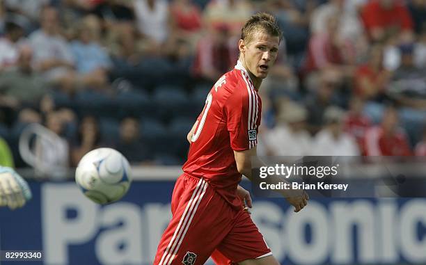 Brian McBride of the Chicago Fire watchs as goalkeeper Dario Sala of FC Dallas kicks the ball during the first half at Toyota Park on September 21,...