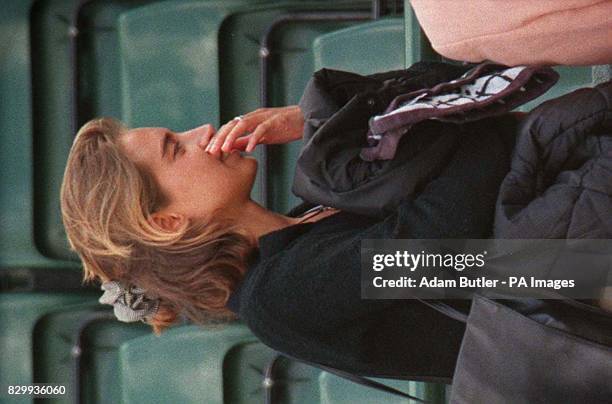 Lucy heald, the girlfriend of British No 1 Tim Henman, leaves the players box this afternoon after his quarter final match against Michael Stich....