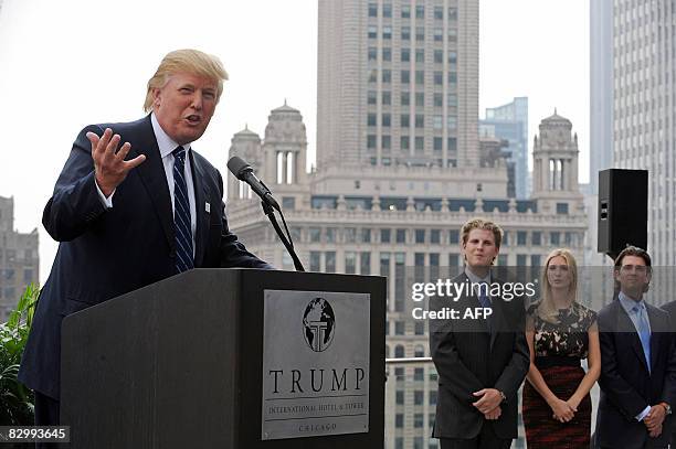 Real estate developer Donald Trump and his children Eric, Ivanka, and Donald Jr., attend a press conference at the Trump International Hotel and...