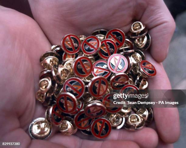 Badge seller on the Lower Ormeau Road, Belfast, offers enamel badges showing a 'No Orange Order Parade' logo. See PA story ULSTER Parade. Photo by...