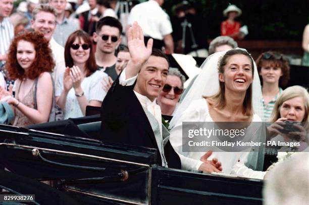 Champion Horse Racing Jockey, Lanfranco "Franki" Dettori with his wife Catherine after their wedding today at Newmarket Catholic Church in Newmarket,...