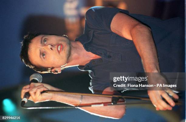 Shortlisted for the Mercury Music Prize Album of the Year Award singer Brett Anderson of Suede performing on stage at London's Grosvenor House Hotel...