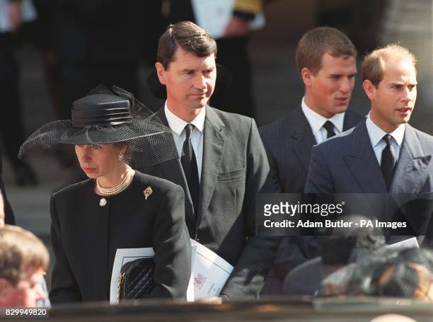 The Princess Royal, her husband Capt.Tim Laurence, her son Peter Phillips and Prince Edward, leave Westminster Abbey following the funeral of Diana,...