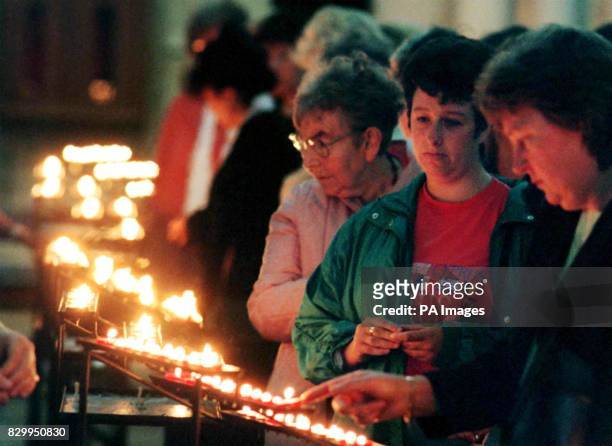 Mourners light candles today in York Minster in remembrance of Diana, Princess of Wales, who died on Sunday, August 31 in a car crash. Photo John...