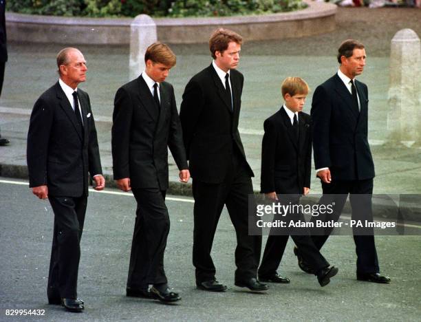 The Prince of Wales, Prince William, Prince Harry, Earl Althorp and Duke of Edinburgh walk behind Diana, the Princess of Wales' funeral cortege.
