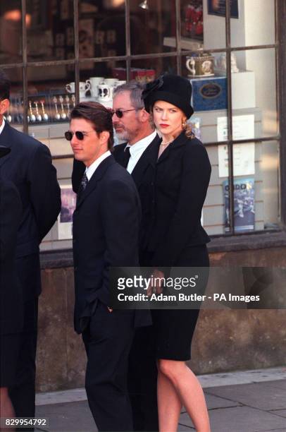 Hollywood star Tom Cruise and his wife, actress, Nicole Kidman arrive at the funeral service for Diana, Princess of Wales with film director Steven...
