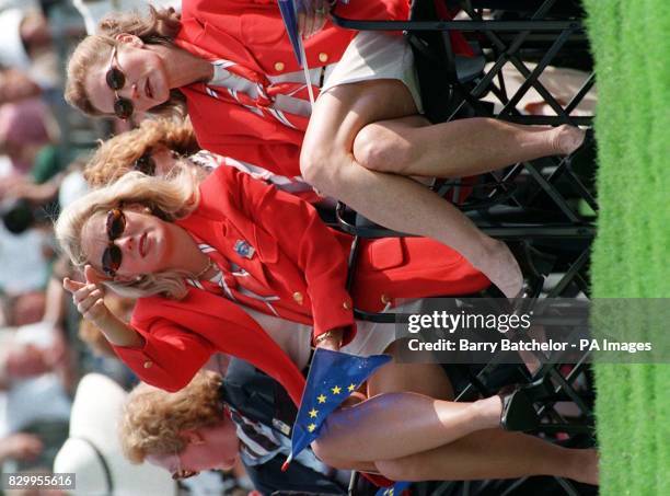 Brenna Cepelak the girlfriend of European Ryder Cup player Nick Faldo makes a point with team-mate Bernhard Langer's wife Vikki during the opening...