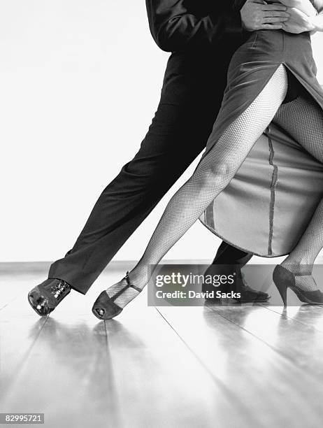 tango dancers - two toned dress stockfoto's en -beelden