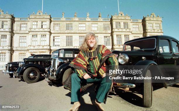 The Marquis of Bath outside Longleat House, in Wilts today with his four classic cars which will be sold at Sotheby's auction next month. Photo Barry...