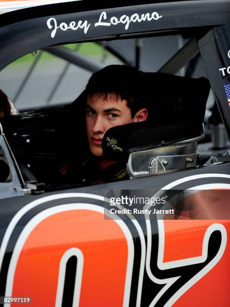 Joey Lagano, driver of the Joe Gibbs Racing Toyota sits in his car during NASCAR Sprint Cup testing at Lowes Motor Speedway on September 24, 2008 in...