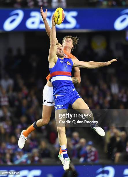 Travis Cloke of the Bulldogs and Rory Lobb of the Giants compete in the ruck during the round 21 AFL match between the Western Bulldogs and the...