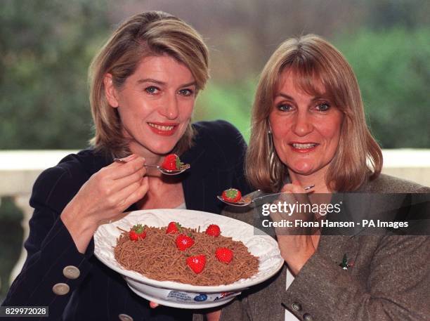 Personality Selina Scott and former cancer patient Lynn Faulds-Wood with a bowl of Kellogs All Bran at a news conference where Kellogs and Cancer...