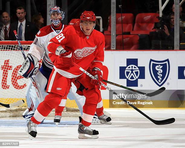 Marian Hossa of the Detroit Red Wings sets up in front of Carey Price of the Montreal Canadiens during the NHL pre-season opener on September 24,...