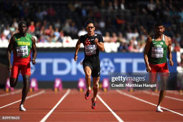 Kurt Felix of Grenada, Keisuke Ushiro of Japan and Larbi Bourrada of Algeria compete in the Men's Decathlon 100 metres during day eight of the 16th...