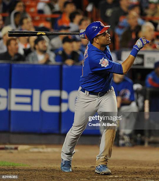 Aramis Ramirez of the Chicago Cubs hits a two run home run against Louis Ayala of the New York Mets during their game at Shea Stadium on September...