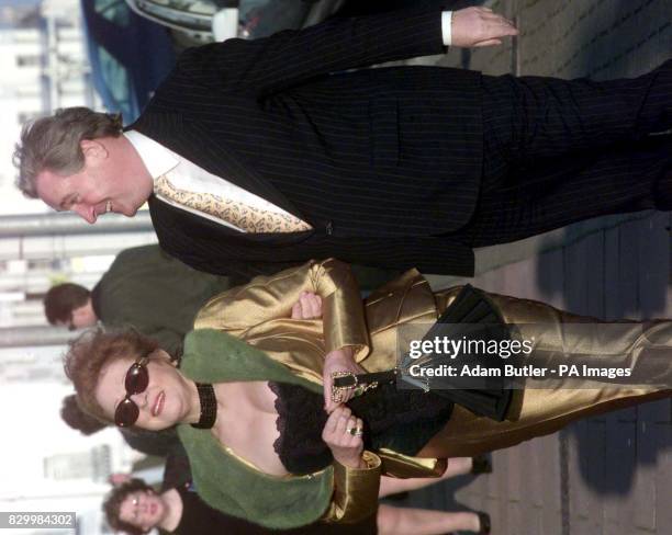 Paymaster General Geoffrey Robinson and his wife Marie-Elena attend the wedding of MP Yvette Cooper to Chancellor Gordon Brown's aide, Ed Balls in...