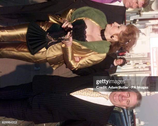 Paymaster General Geoffrey Robinson arrives with his wife Marie-Elena for the wedding of MP Yvette Cooper to Chancellor Gordon Brown's aide, Ed...