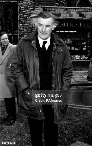 Poet Laureate Ted Hughes attending a memorial service for the poet Philip Larkin at Westminster Abbey.