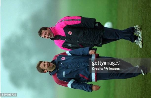 Middlesbrough manager Bryan Robson shares a joke with former Paul Merson, during training today before his team's FA Cup match against Arsenal on...