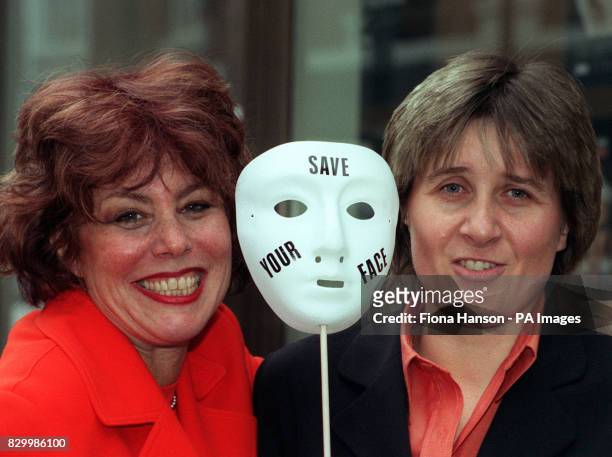 Chat show host Ruby Wax with Michelle Holloway, who had her ear bitten off, poses for the media during a photocall in London today where they helped...