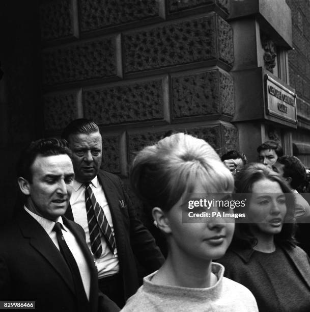 PA NEWS PHOTO 22/7/63 : CHRISTINE KEELER AND MARILYN RICE-DAVIES DRIVING AWAY FROM THE OLD BAILEY, LONDON AFTER THE FIRST DAY'S HEARING IN WHICH DR....