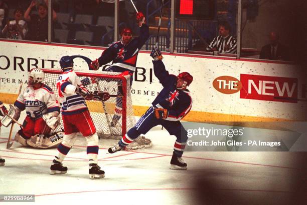 PA NEWS PHOTO 1/09/93 GREAT BRITAIN JOY AS PATRICK SCOTT CELEBRATES SCORING HIS SIDES SECOND GOAL IN THEIR CRUCIAL MATCH GAINST LATVIA IN THE ICE...