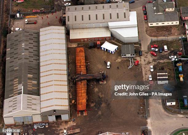 The giant Angel of the North lies in the yard at Hartlepool where it was built, as construction workers assemble the parts today before dismantling...