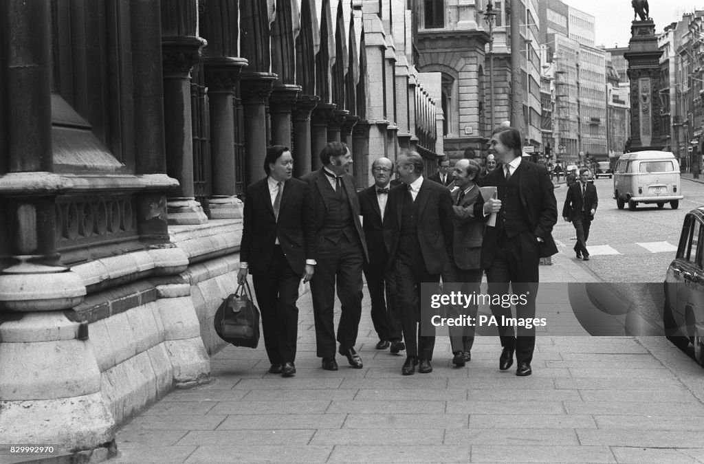 PA NEWS PHOTO 14/5/72  MEMBERS OF THE GOVERNMENTS BRITISH RAILWAYS BOARD TEAM ON THEIR WAY TO THE HEARING OF THE RAIL UNIONS APPEAL AGAINST THE INDUSTRIAL RELATIONS COURT ORDER FOR A BALLOT IN LONDON. FROM LEFT TO RIGHT: PROFESSOR KENNETH WEDDERBURN (FOR THE NUR), PETER PAIN QC (FOR ASLEF), ERIC FALK (ASLEF), MORRIS FINER QC (TRANSPORT SALARIED STAFF ASSOCIATION), A CLERK AND   ALEXANDER IRVINE (ASSISTING MORRIS FINER).   (Photo by PA Images via Getty Images)