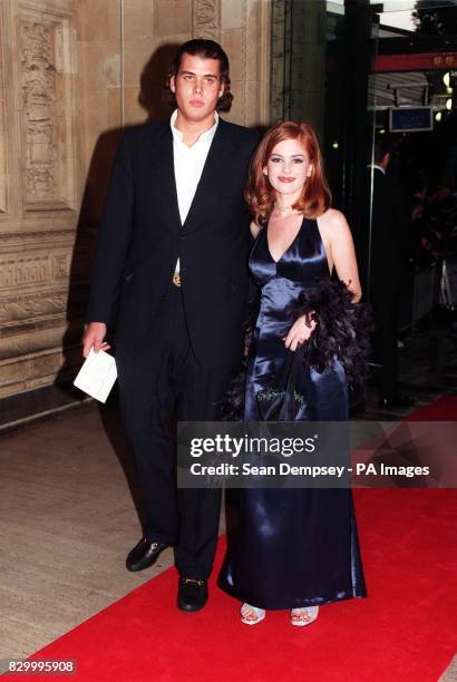 AUSTRALIAN SOAP ACTRESS ISLA FISHER AND HER BOYFRIEND ANTHONY DE ROTHSCHILD ARRIVE AT THE ROYAL ALBERT HALL, IN LONDON, FOR THE NATIONAL TELEVISION...