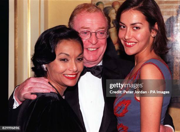 Actor Michael Caine with his wife Shakira and daughter Natasha in London's Dorchester Hotel tonight where he picked up the Dilys Powell award for...