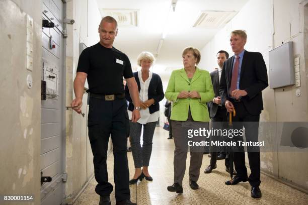 German Chancellor Angela Merkel visits with Monika Gruetters federal commissioner for Culture and Media and Hubertus Knabe Director of the Stasi...
