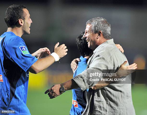 Montpellier's coach Rolland Courbis reacts with players during the French League Cup football match Montpellier vs. Lille at Mosson stadium on...